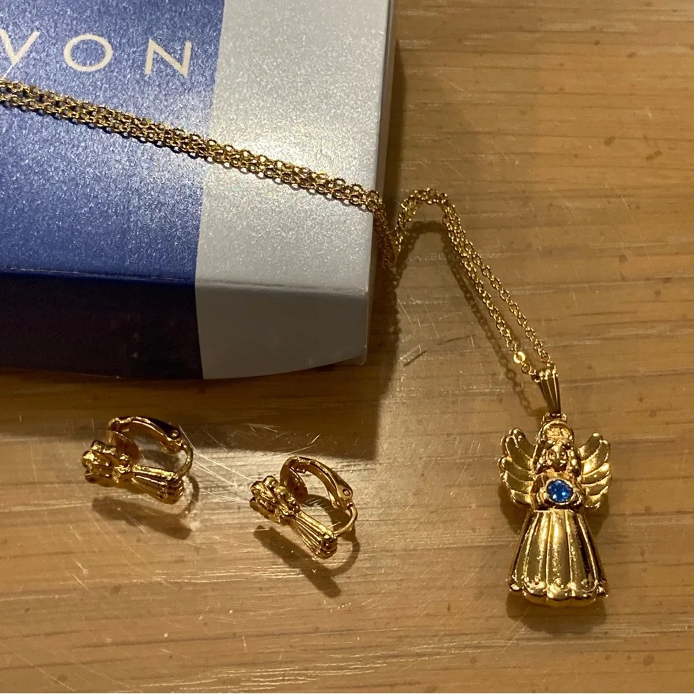 Vintage 90’s Avon Golden Heavenly Angel Pendant/Clip on Earrings. Blue Stone